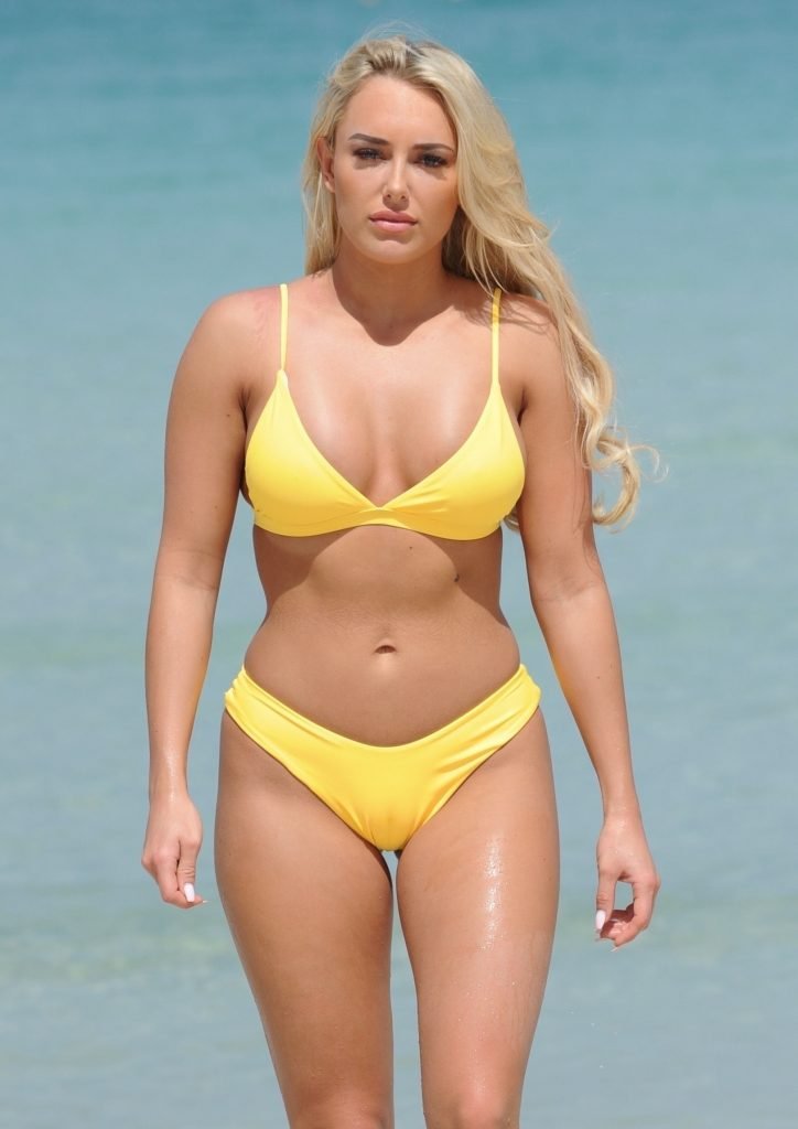 Amber Turner Shows Off Her Assets On The Beach (27 Photos)