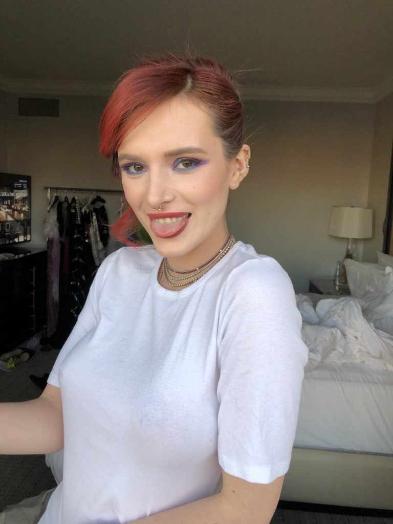 Bella Thorne Flashes Her Fake Boobs (7 Pics)