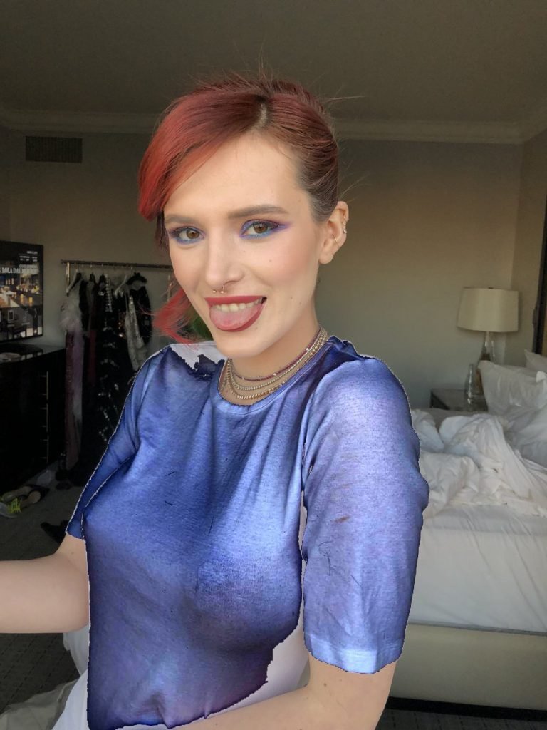 Bella Thorne Flashes Her Fake Boobs (7 Pics)