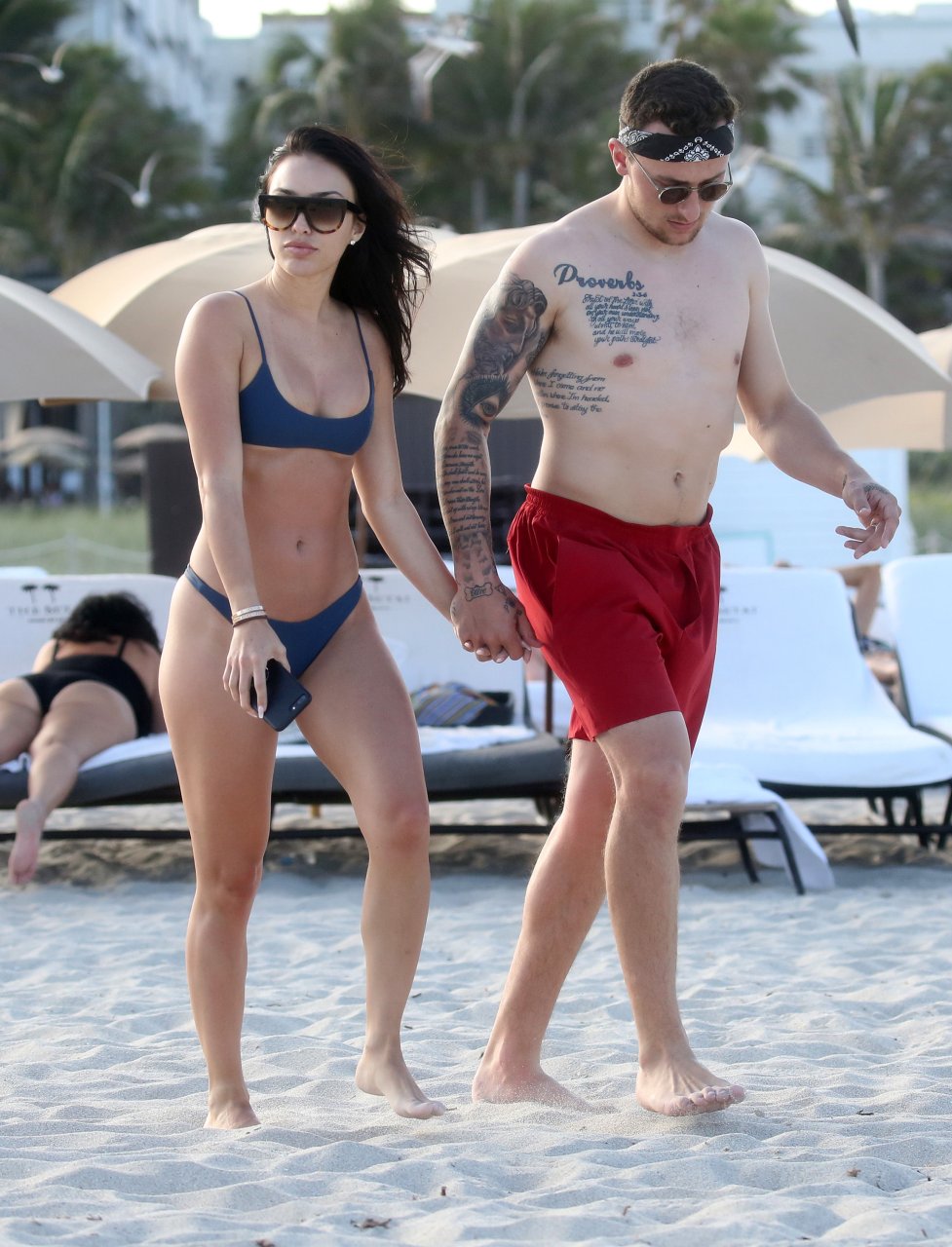 Johnny Manziel and bikini-clad fiance model Bre Tiesi show off their beach ...