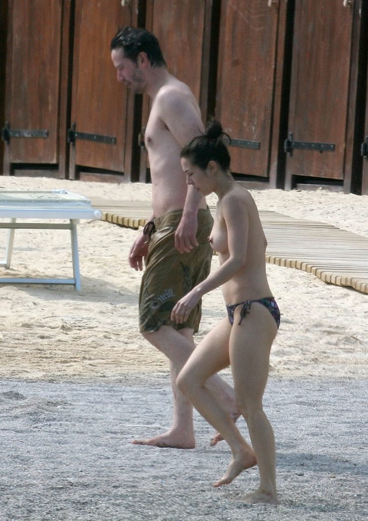 China Chow Goes Topless At The Beach (28 Photos)