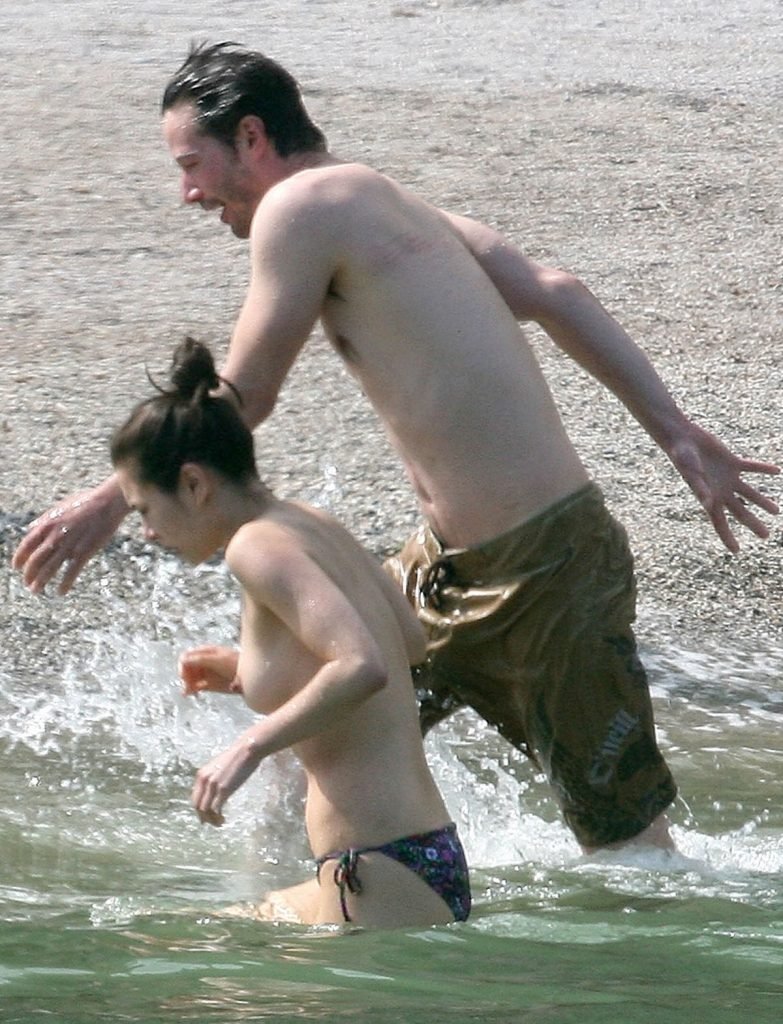 China Chow Goes Topless At The Beach (28 Photos)