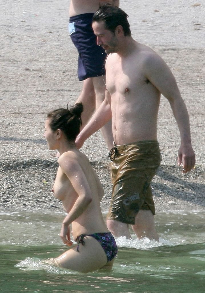 China Chow Goes Topless At The Beach (28 Photos)