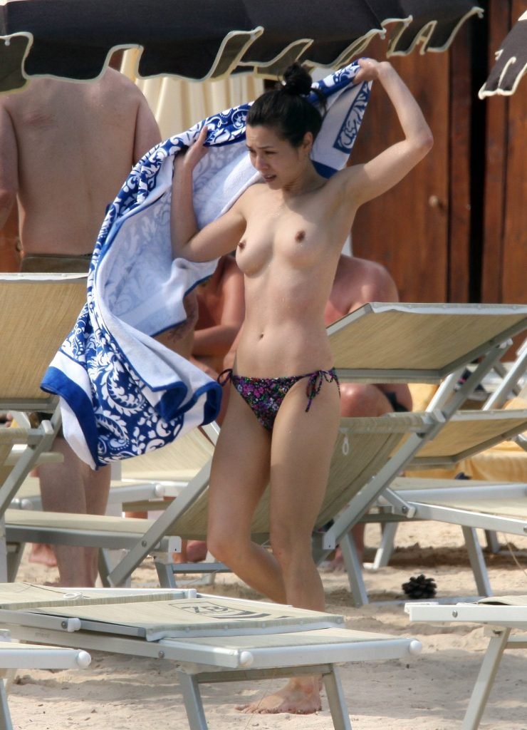 China Chow Goes Topless At The Beach (28 Photos)