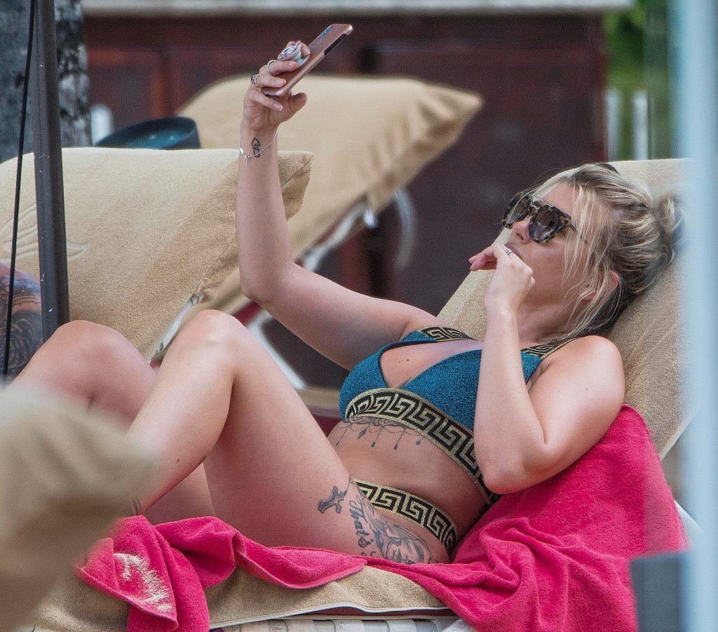 Olivia Buckland Flashes Her Booty In A Thong Bikini (33 Photos + Gif)