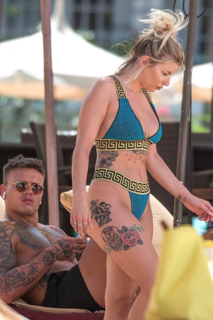 Olivia Buckland Flashes Her Booty In A Thong Bikini (33 Photos + Gif)