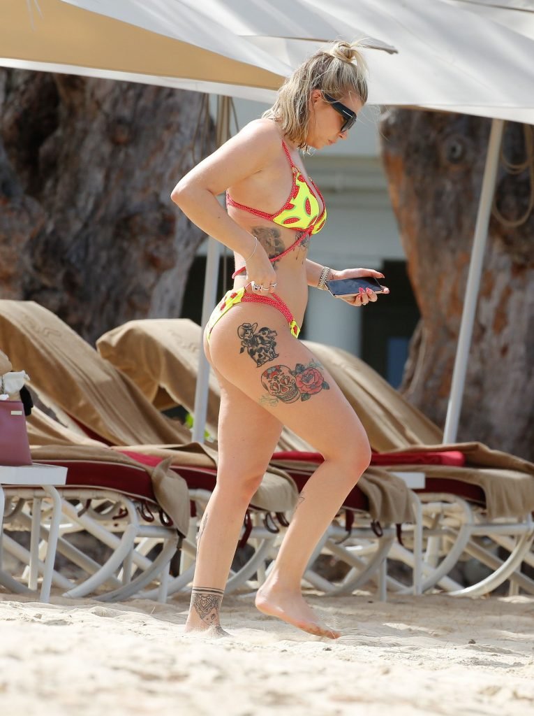 Olivia Buckland Displays Her Tattooed Body in Barbados (29 Photos + Video)