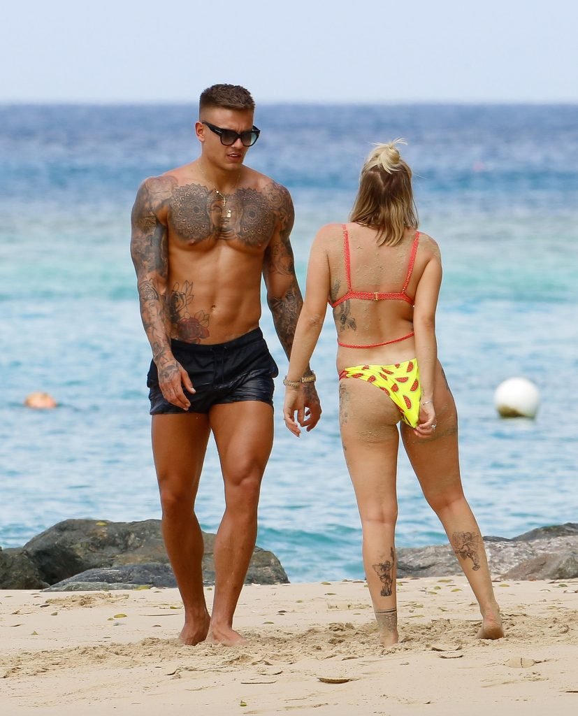 Olivia Buckland Displays Her Tattooed Body in Barbados (29 Photos + Video)