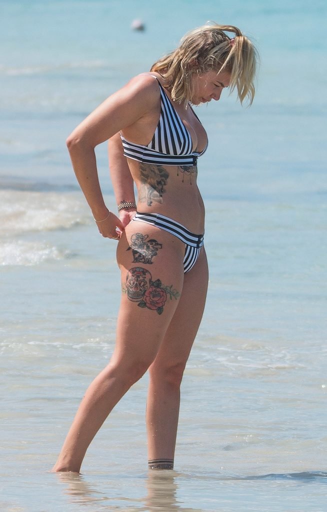 Olivia Buckland Hits The Beach In A Black And White Bikini (57 Photos + Video)
