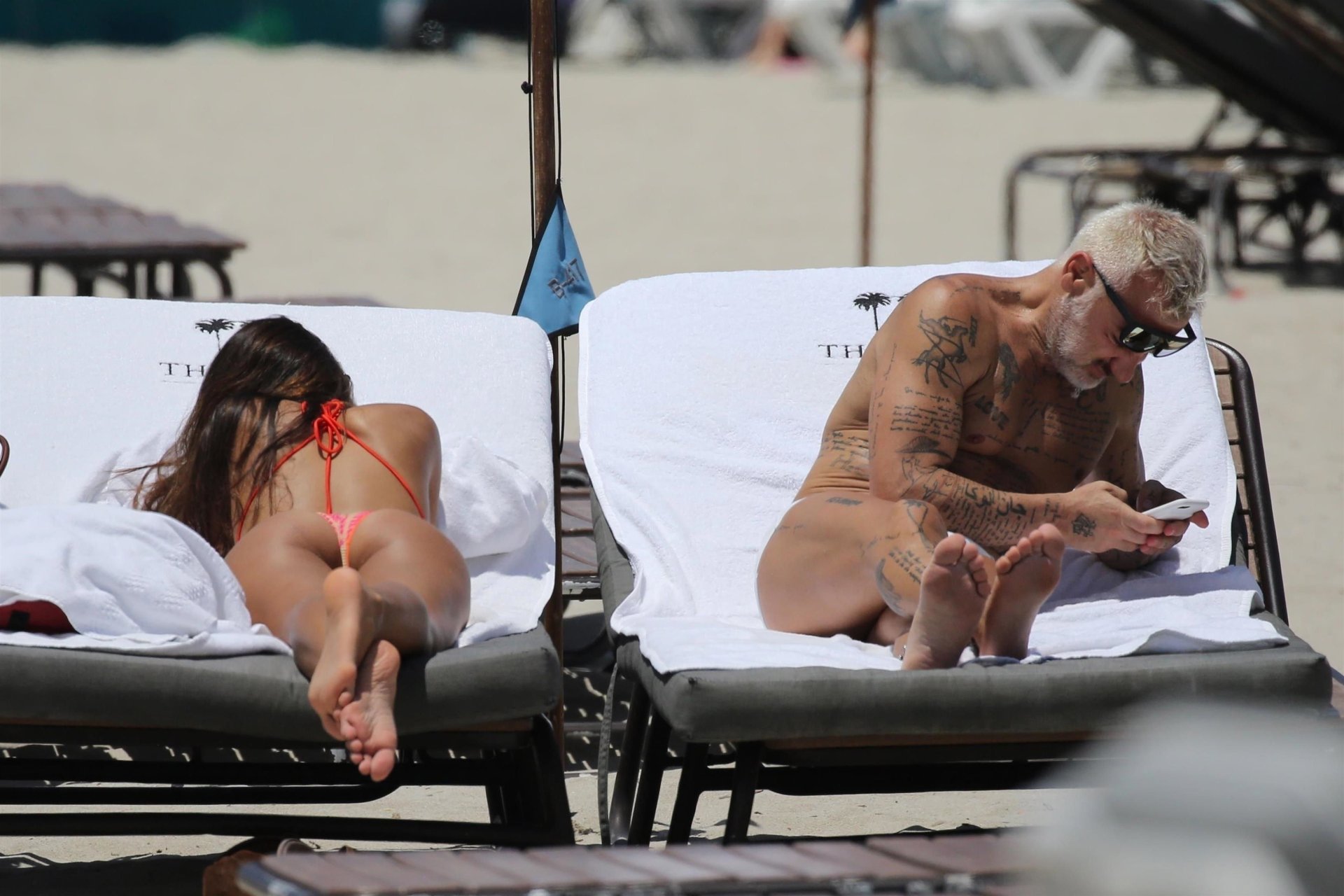 Gianluca Vacchi and Sharon Fonseca enjoy a little relaxing time on the beac...