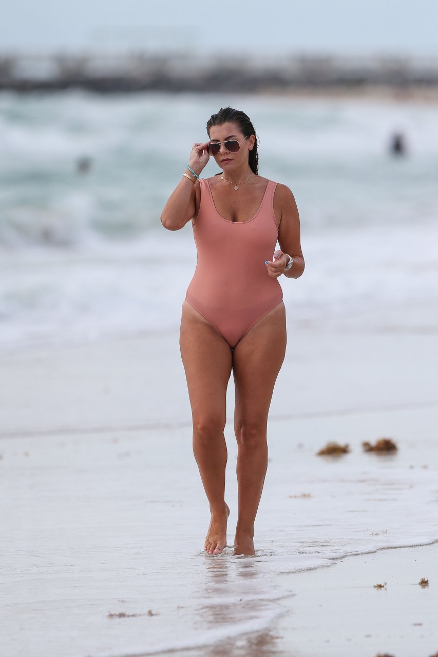Imogen thomas puts on a very busty display as she slips into an eye