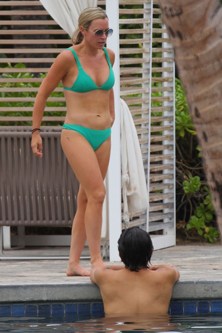 Teddi Jo Mellencamp was seen wearing a green bikini poolside the day of fel...