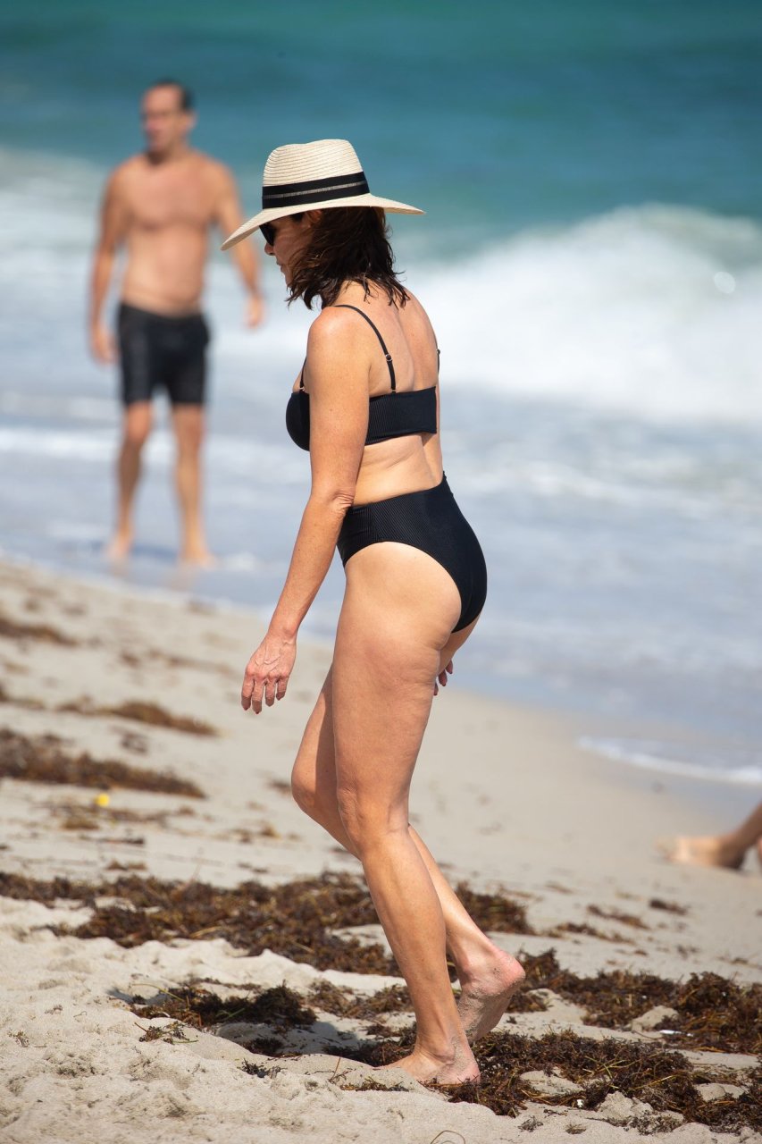 Luann de Lesseps shows off her bikini body on the beach in Miami, Tuesday a...