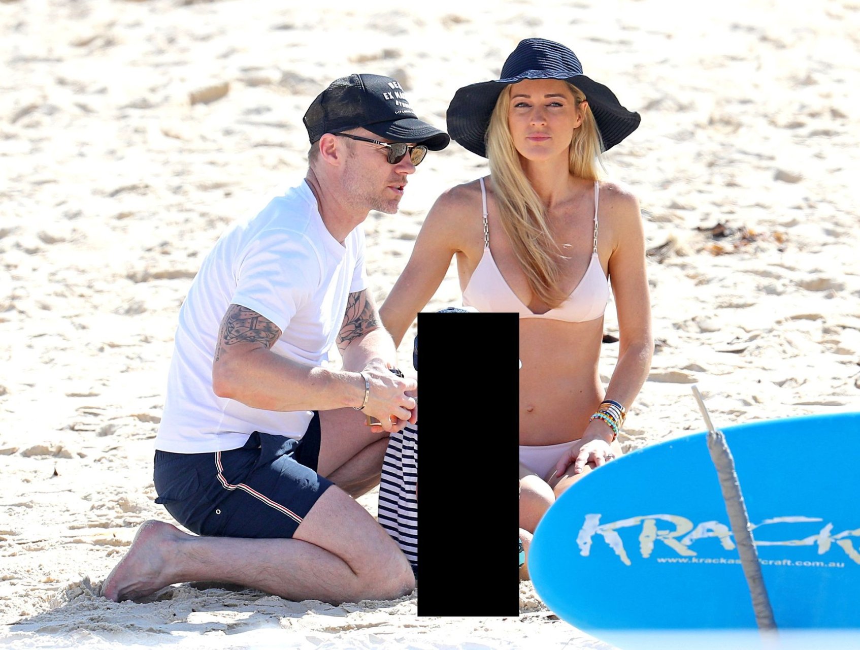 Ronan Keating and his wife Storm enjoy a beach outing with their son Cooper...