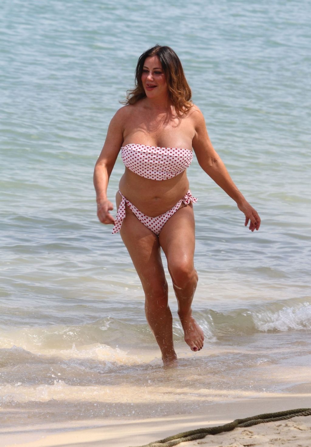 Leaked lisa appleton topless on a beach again