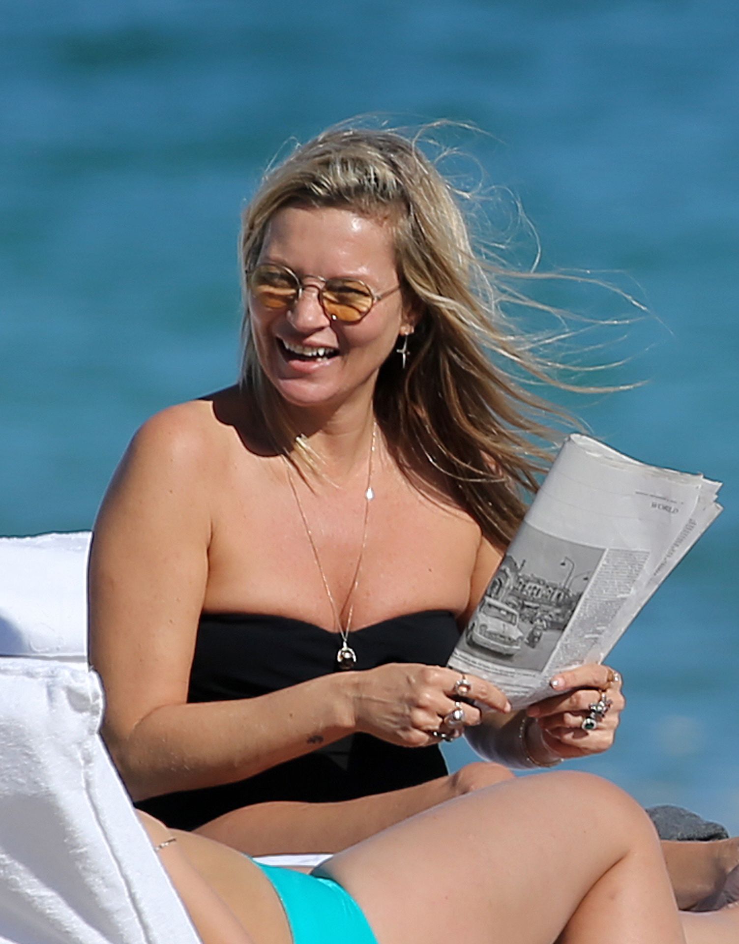 Leaked kate moss caught topless during beach photoshoot