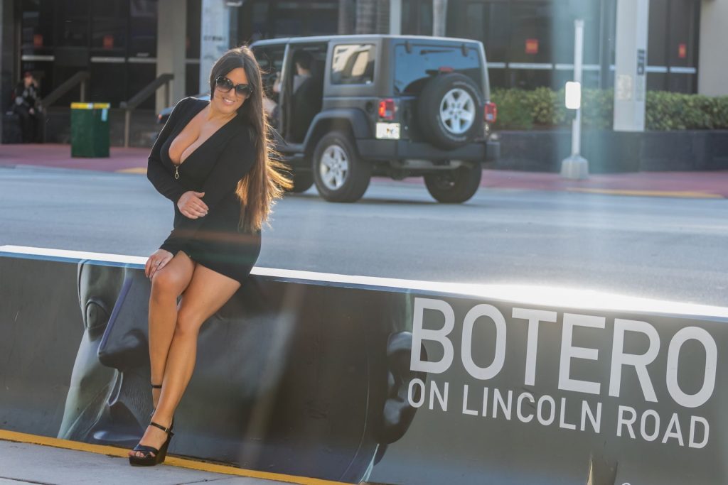 Claudia Romani Shows Cleavage in a Little Black Dress (20 Photos)