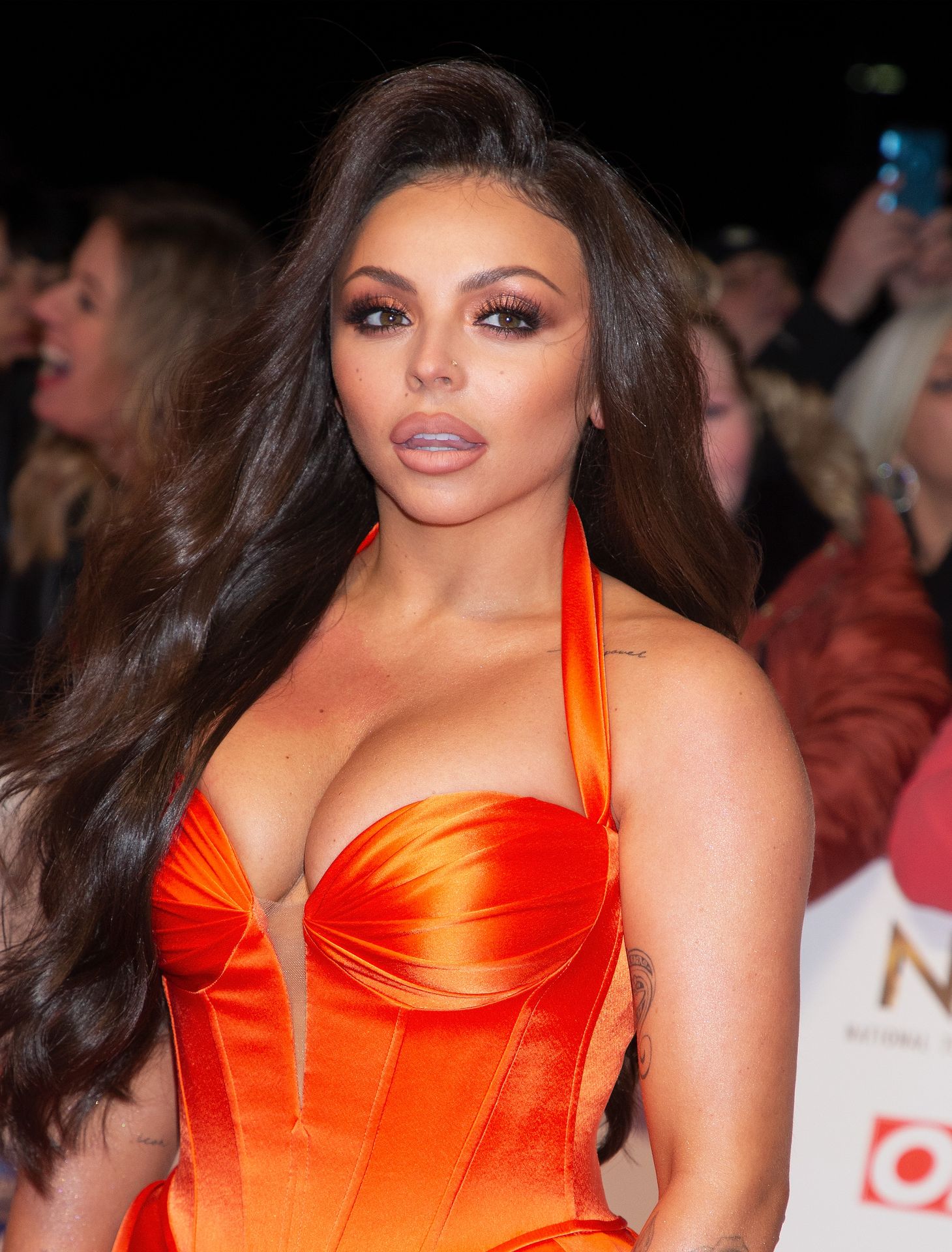 Busty singer Jesy Nelson and Chris Hughes attend National TV Awards Red Car...