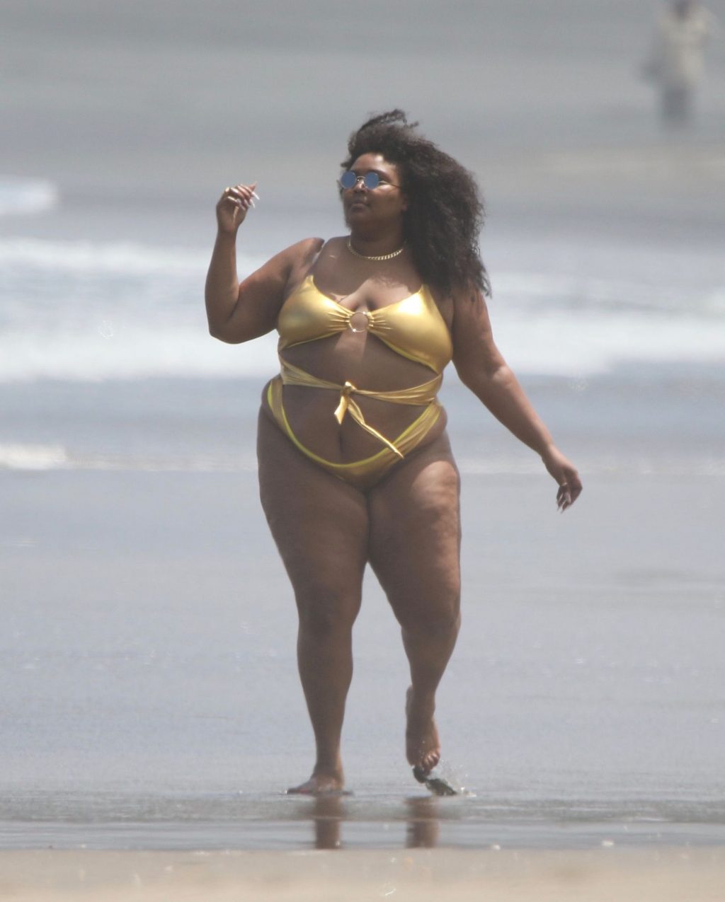 Lizzo Stands Out in a Gold Bikini in Auckland (36 Photos)