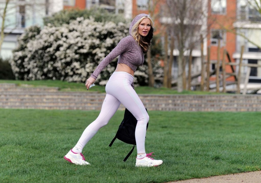 Caprice Takes a Serene Approach by Practicing the Art of Yoga in a London park (10 Photos)