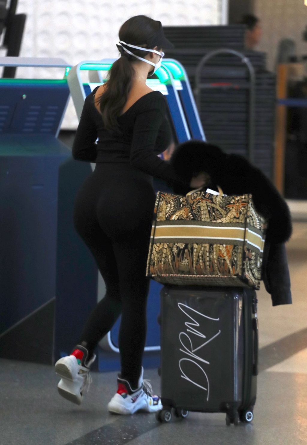 Demi Rose Wears a Face Mask as She Jets Out of Los Angeles International Airport (15 Photos)