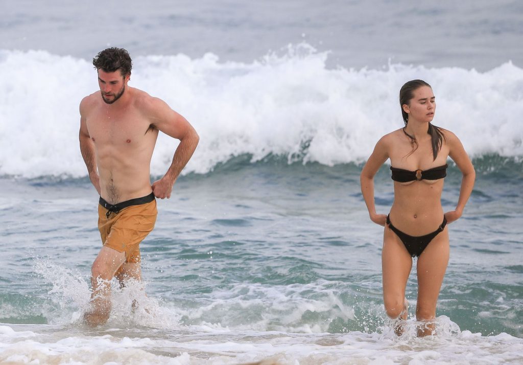 Liam Hemsworth Shows Off His Ripped Beach Bod During A Morning Swim With Gabriella Brooks In Byron Bay (25 Photos)