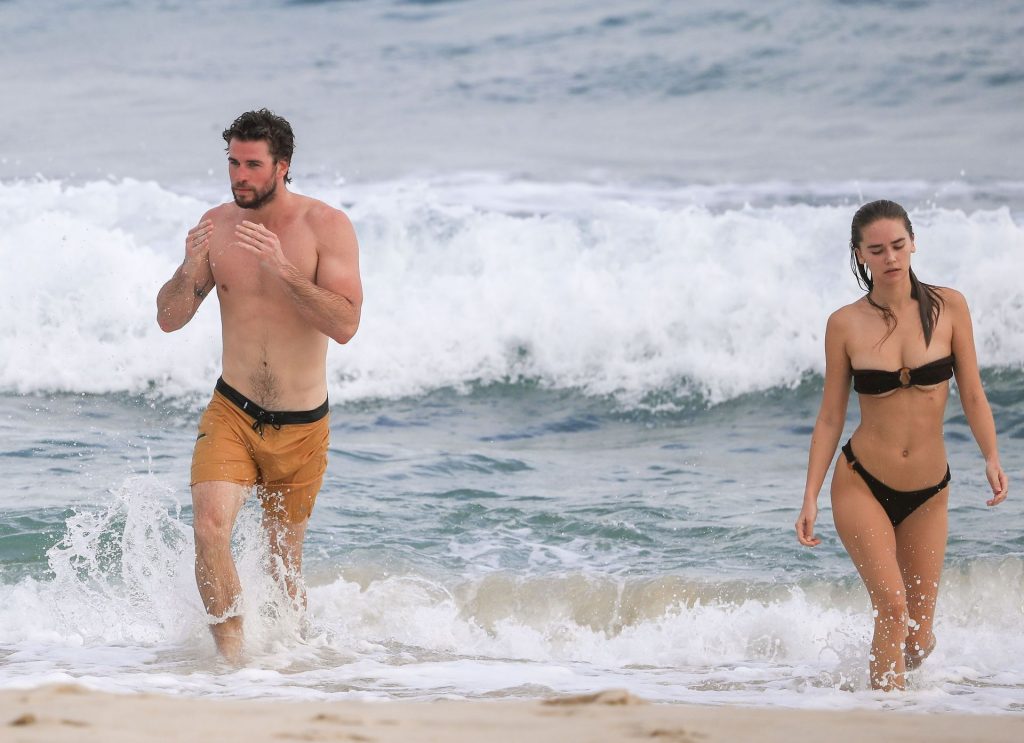 Liam Hemsworth Shows Off His Ripped Beach Bod During A Morning Swim With Gabriella Brooks In Byron Bay (25 Photos)