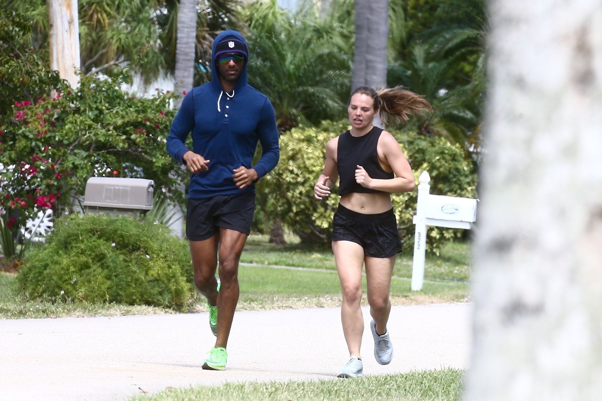 Hannah Brown Goes Jogging with her Trainer During Self-Quarantine in Florid...