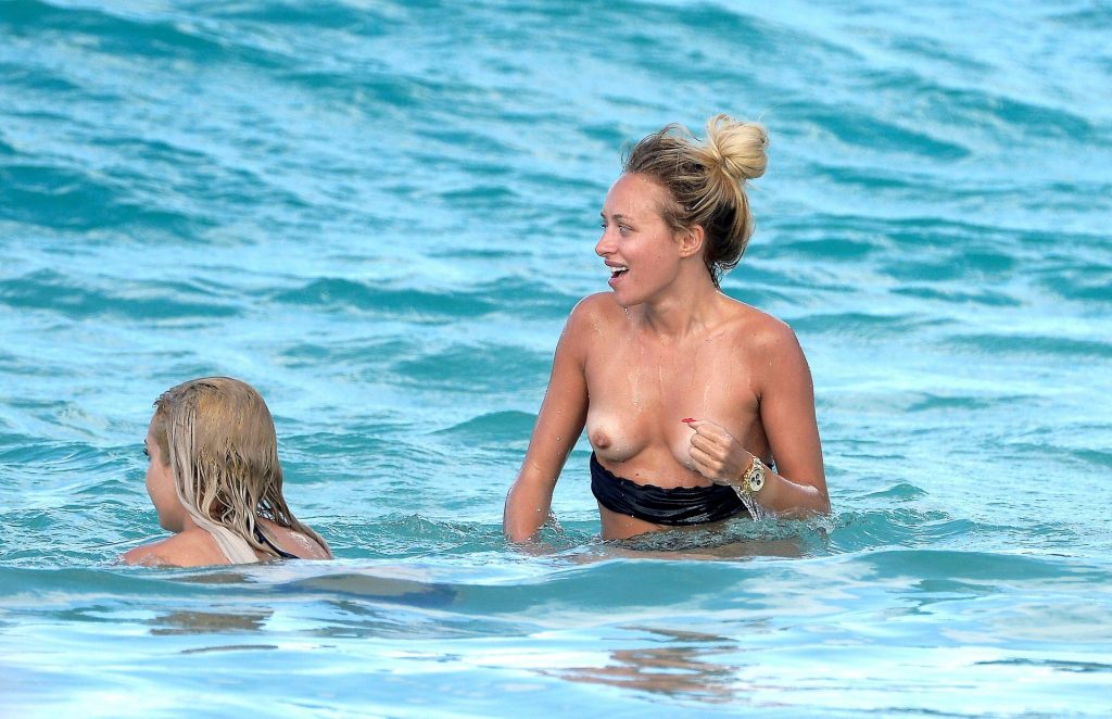 Lana Scolaro Shows Her Nude Tits on the Beach (12 Photos)