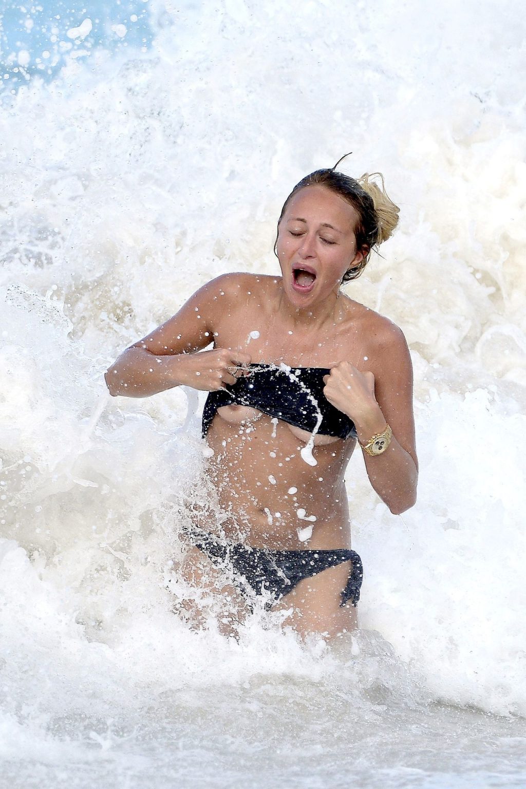 Lana Scolaro Shows Her Nude Tits on the Beach (12 Photos)