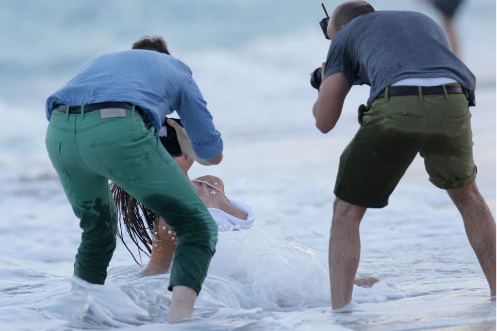 Nina Agdal Has a Couple Wardrobe Malfunctions While Navigating The Surf For a Photoshoot (25 Photos)