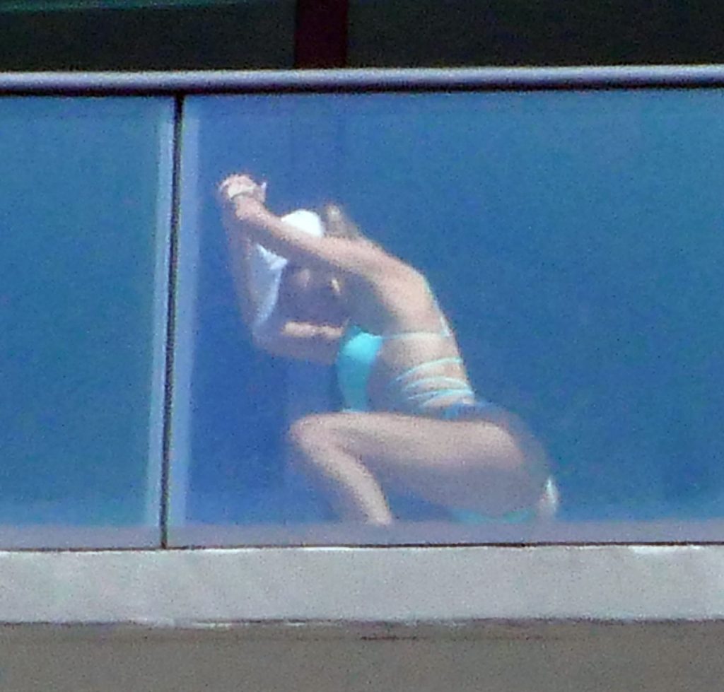 Cindy Prado Shows Off Her Curves in a Small Blue Bikini as She Works Out on a Balcony in Miami (28 Photos)
