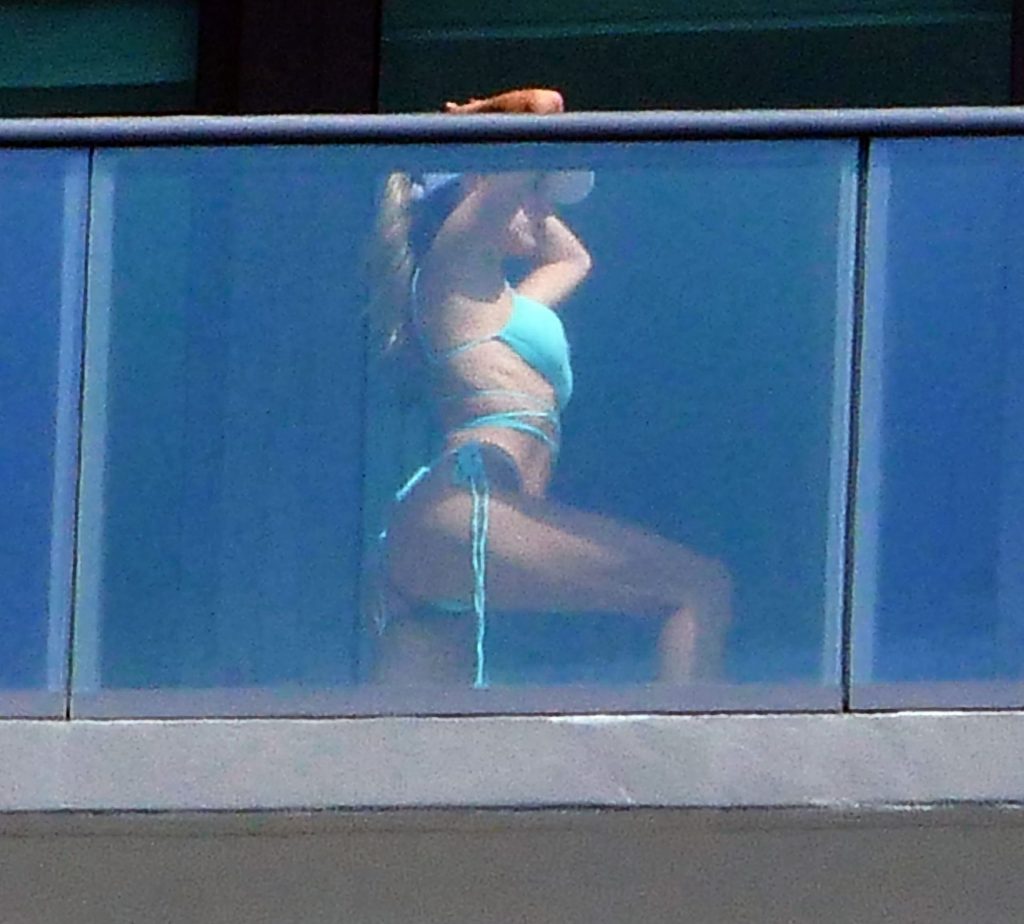 Cindy Prado Shows Off Her Curves in a Small Blue Bikini as She Works Out on a Balcony in Miami (28 Photos)