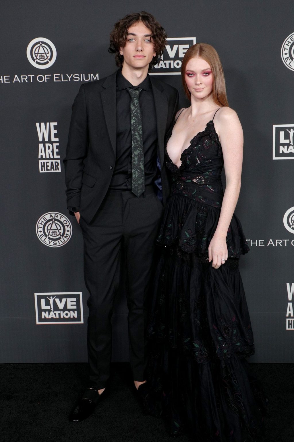 Larsen Thompson Shows Off Her Tits at The Art of Elysium Event (12 Photos + Video)