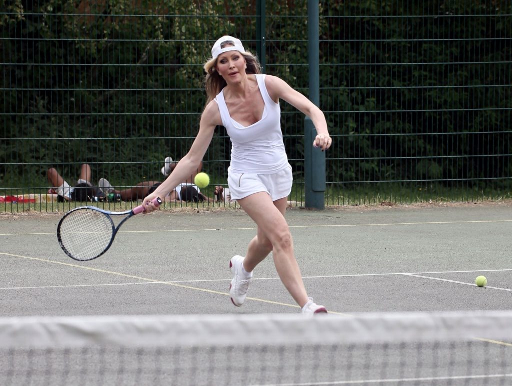 Model Caprice Works Up a Sweat as She Plays a Game of Tennis (13 Photos)