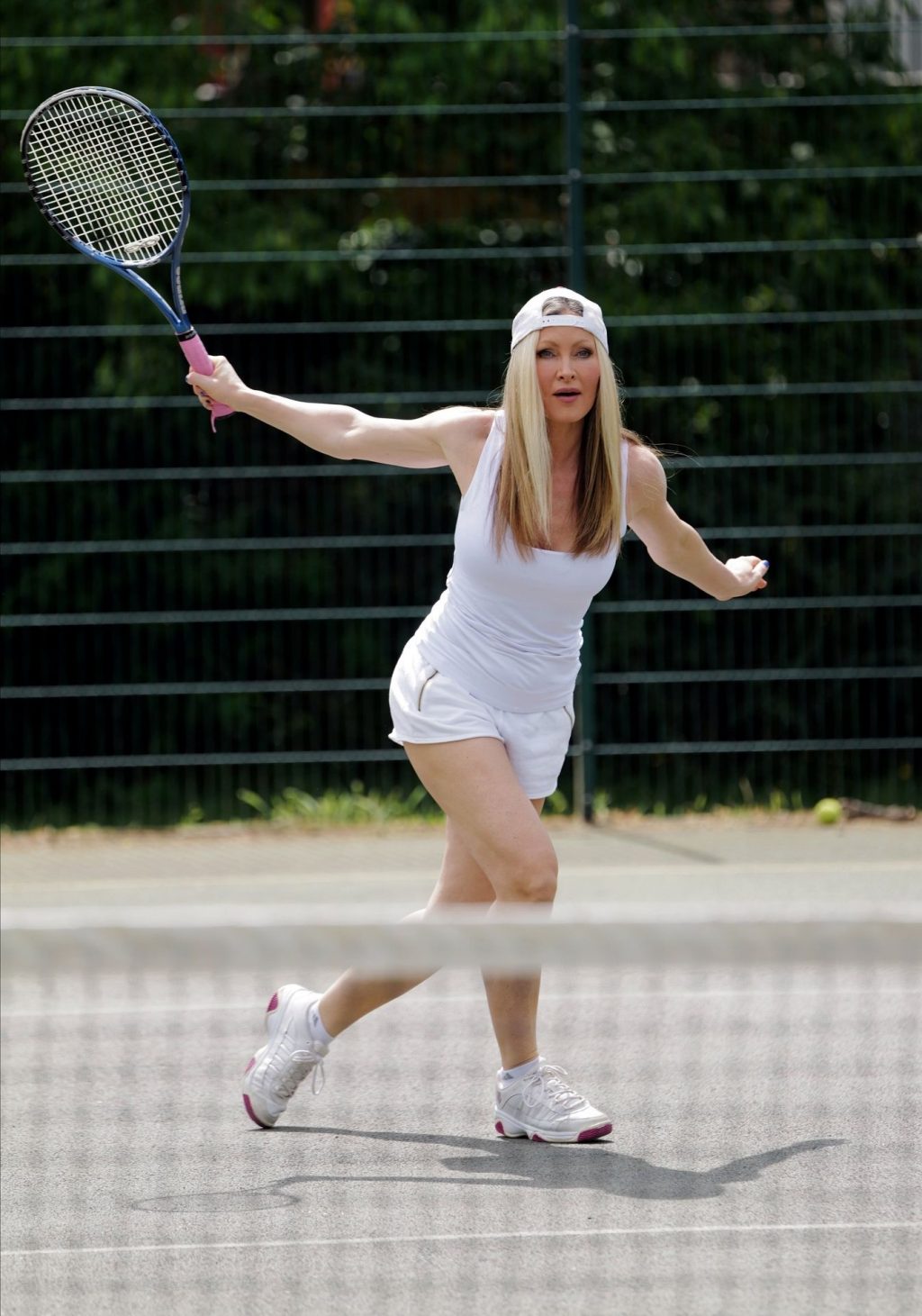 Model Caprice Works Up a Sweat as She Plays a Game of Tennis (13 Photos)