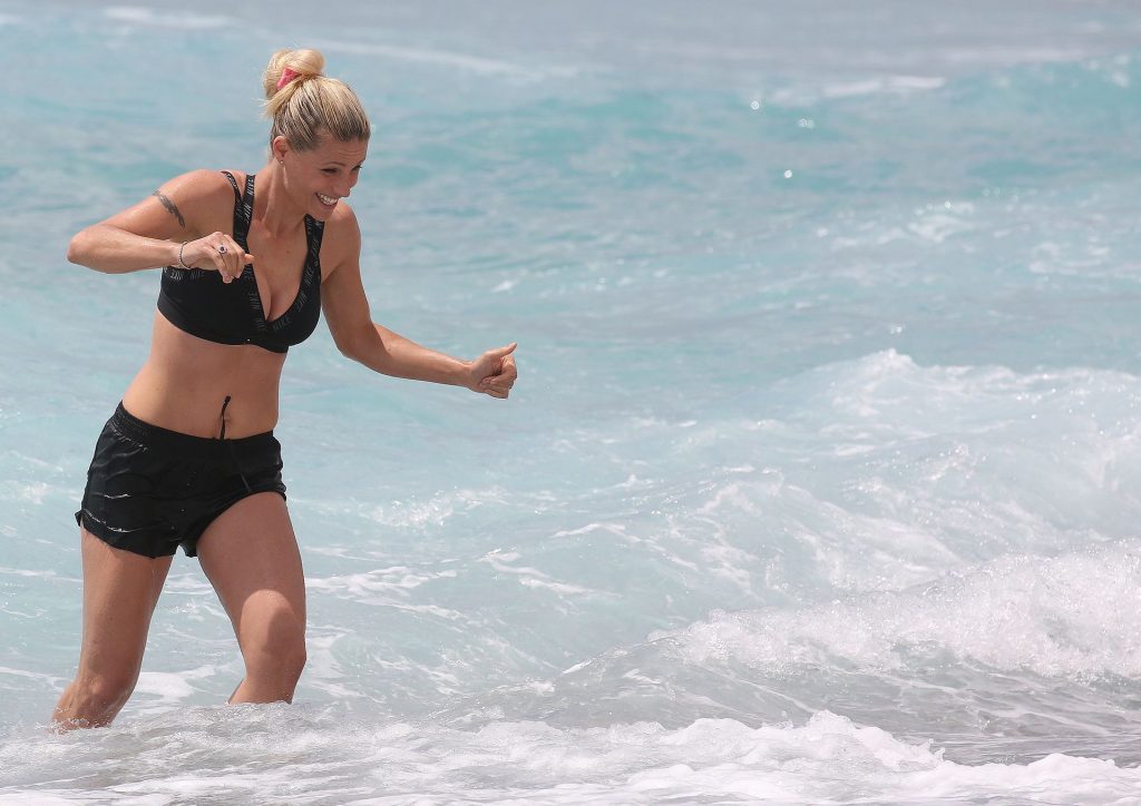 Michelle Hunziker Shows Off Her Sexy Body on the Beach (16 Photos)