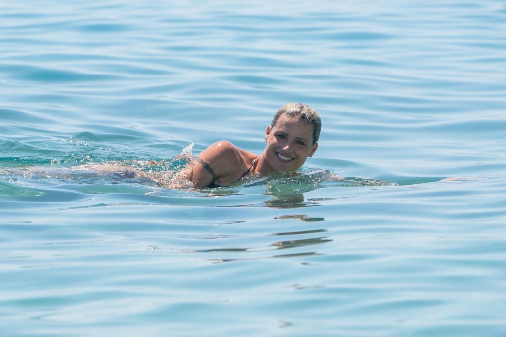 Michelle Hunziker Relaxes Swimming in the Sea (31 Sexy Photos)