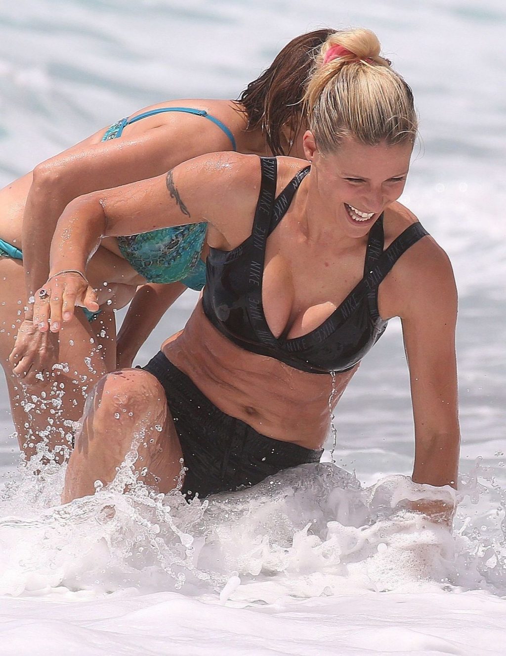 Michelle Hunziker Shows Off Her Sexy Body on the Beach (16 Photos)