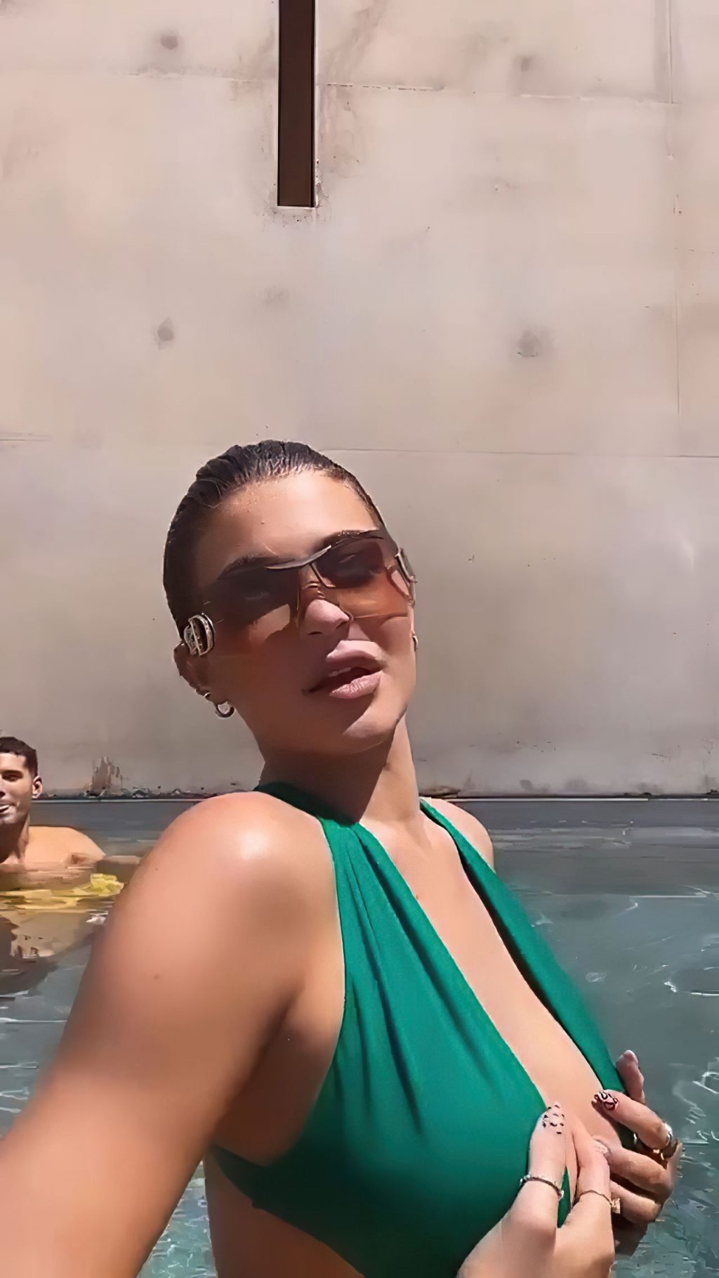 Kylie Jenner Shows Off Her Big Boobs in a Pool (21 Pics+ GIFs &amp; Video)