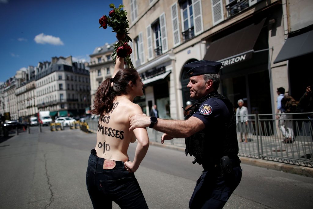 Topless Woman Protests in Front of the Elysee Palace in Paris (56 Photos)