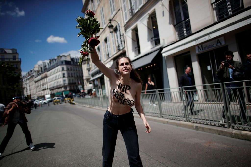 Topless Woman Protests in Front of the Elysee Palace in Paris (56 Photos)