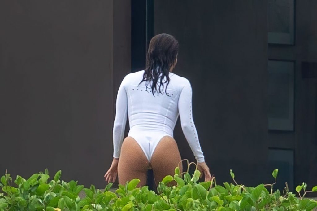 Eva Longoria Flaunts Her Sexy Body in a White Swimsuit (13 Photos)