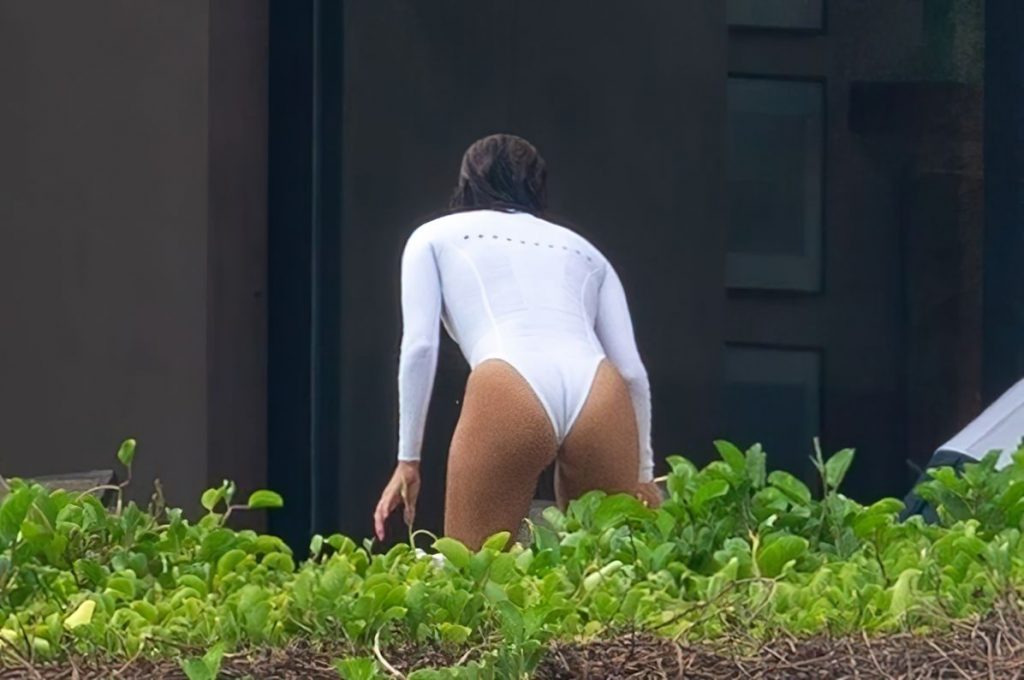 Eva Longoria Flaunts Her Sexy Body in a White Swimsuit (13 Photos)
