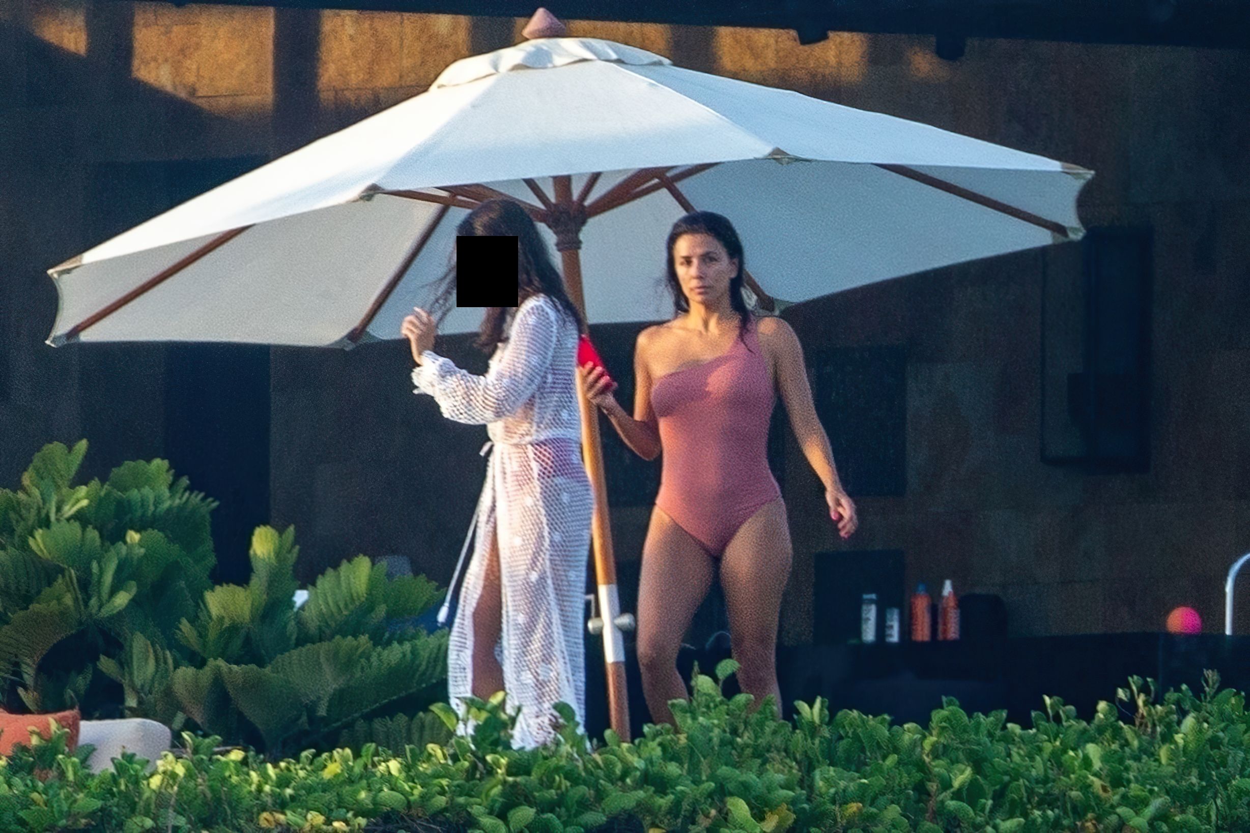Eva Longoria Almost Loses Bikini Bottoms On Nudist Beach
