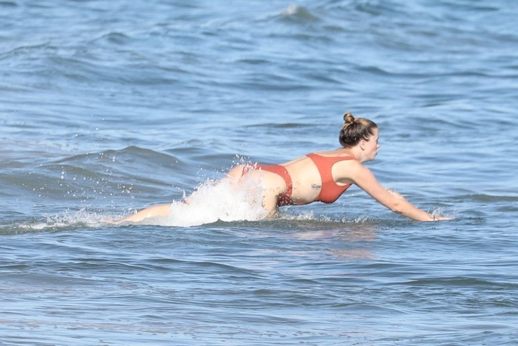 Ireland Baldwin Stuns in a Swimsuit While Enjoying a Beach Day (297 New Photos)