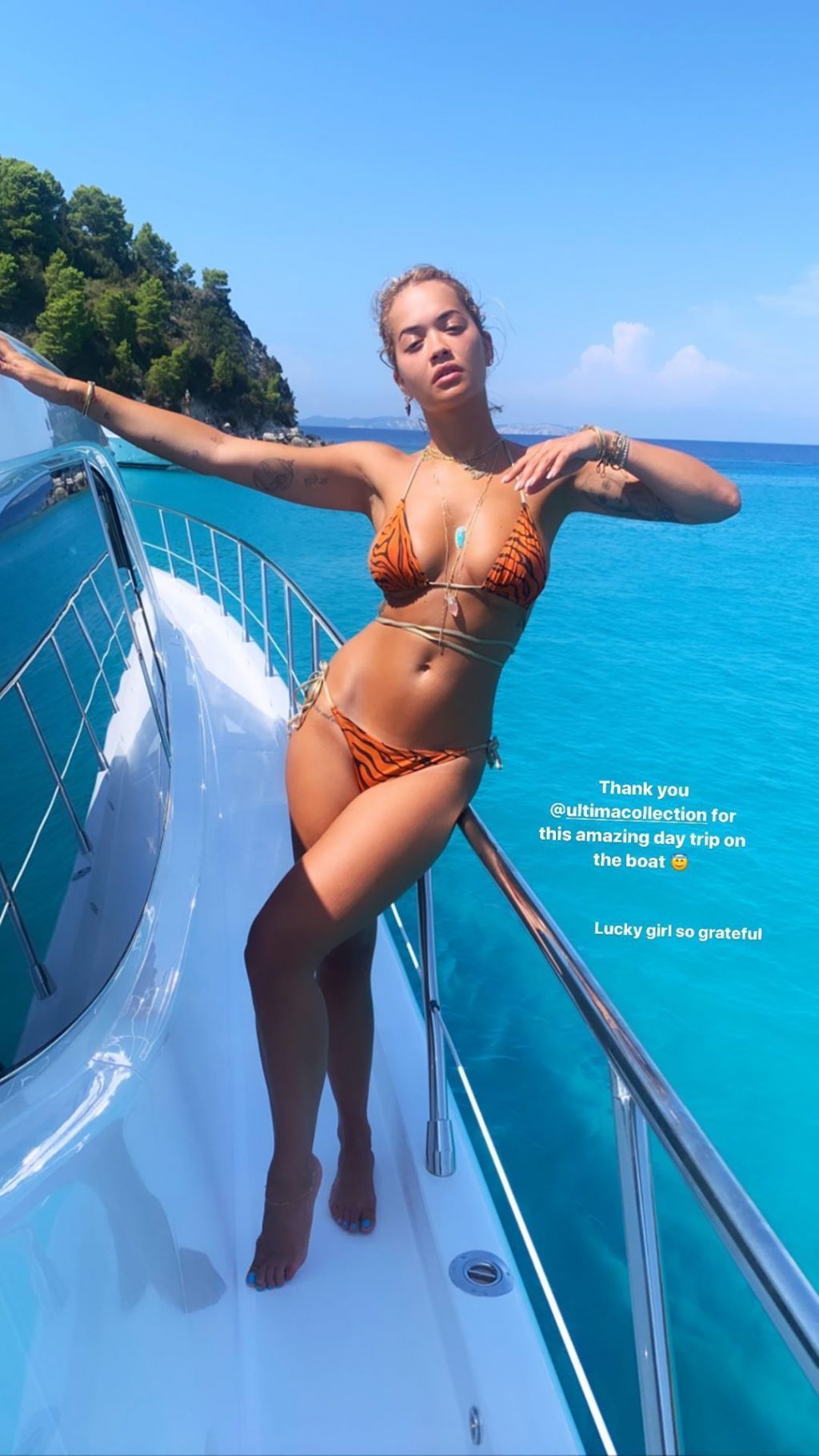 Rita Ora Displays Her Sexy Body on a Yacht (18 Photos + Video)