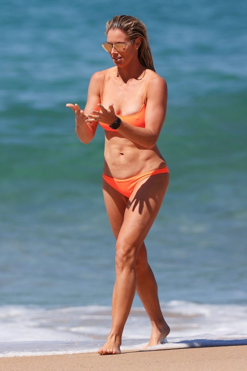 Candice Warner Displays Her Incredible Physique While Enjoying a Swim in Maroubra (83 Photos)