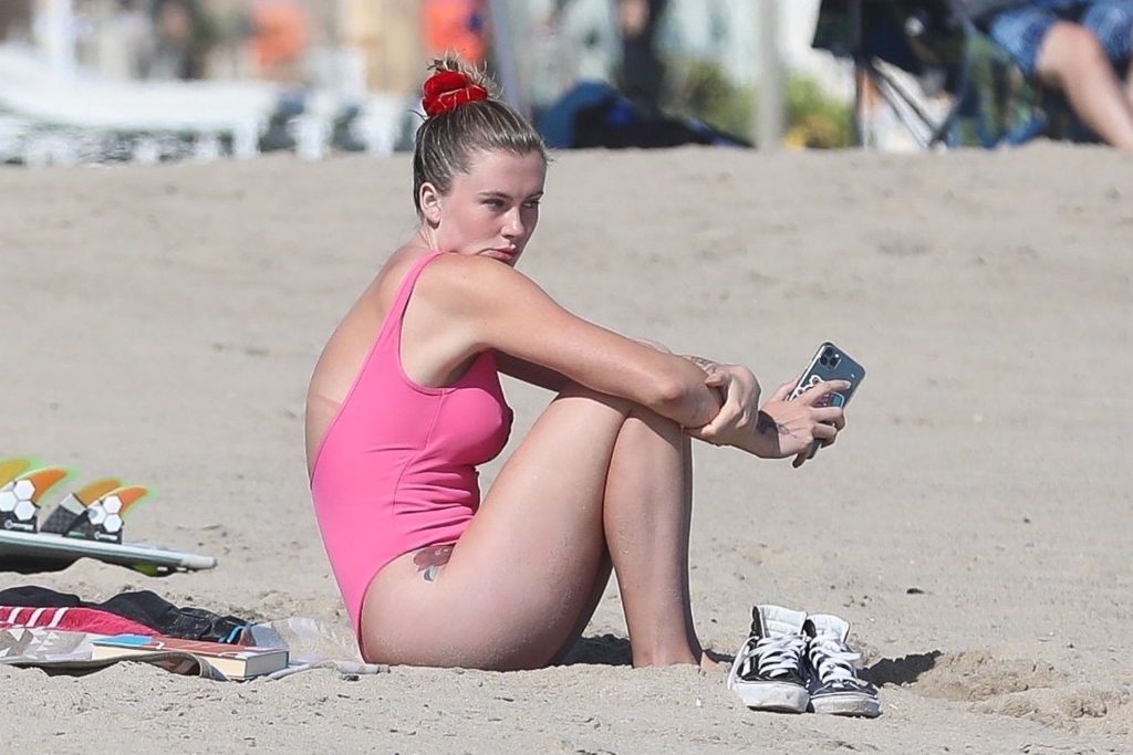 Ireland Baldwin Flaunts Sexy Legs and Flashes Tattoos in a Pink Swimsuit (11 Photos)