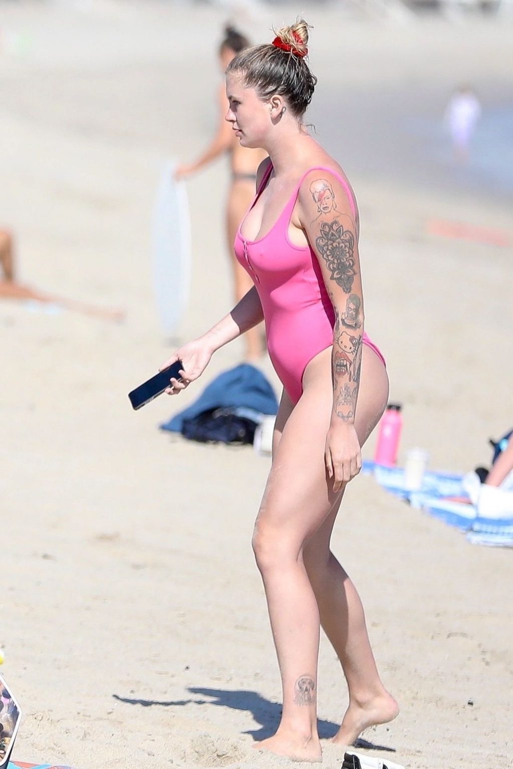 Ireland Baldwin Flaunts Sexy Legs and Flashes Tattoos in a Pink Swimsuit (11 Photos)
